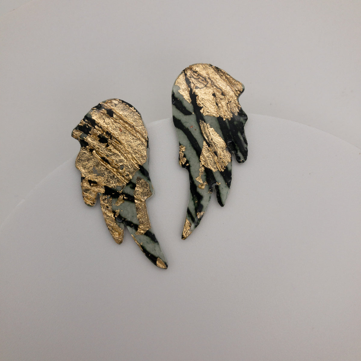 Wings of Desire sgraffito earrings in gold/forest green