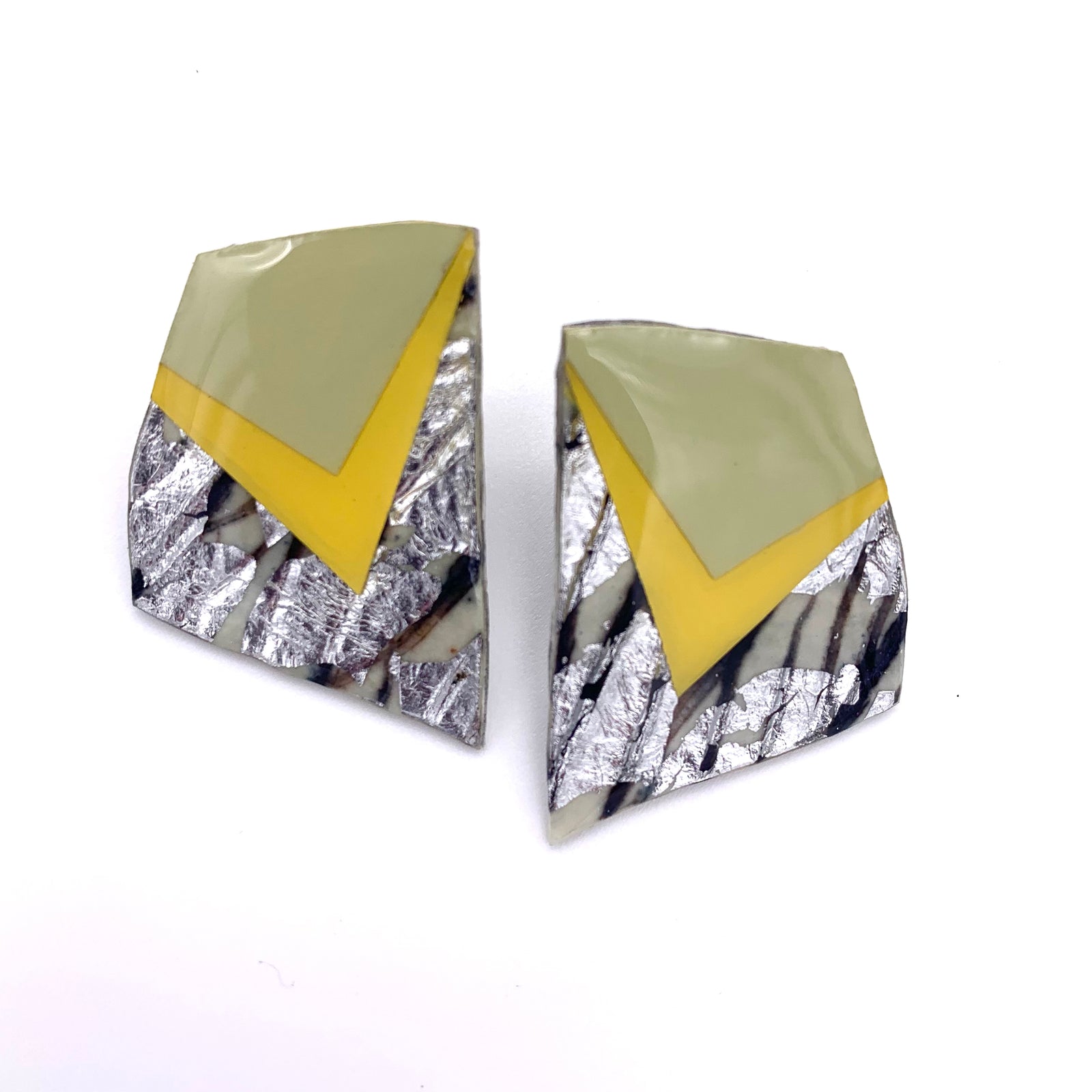 Stunning geometric stud earrings in yellow and silver designed and handmade in Ireland 