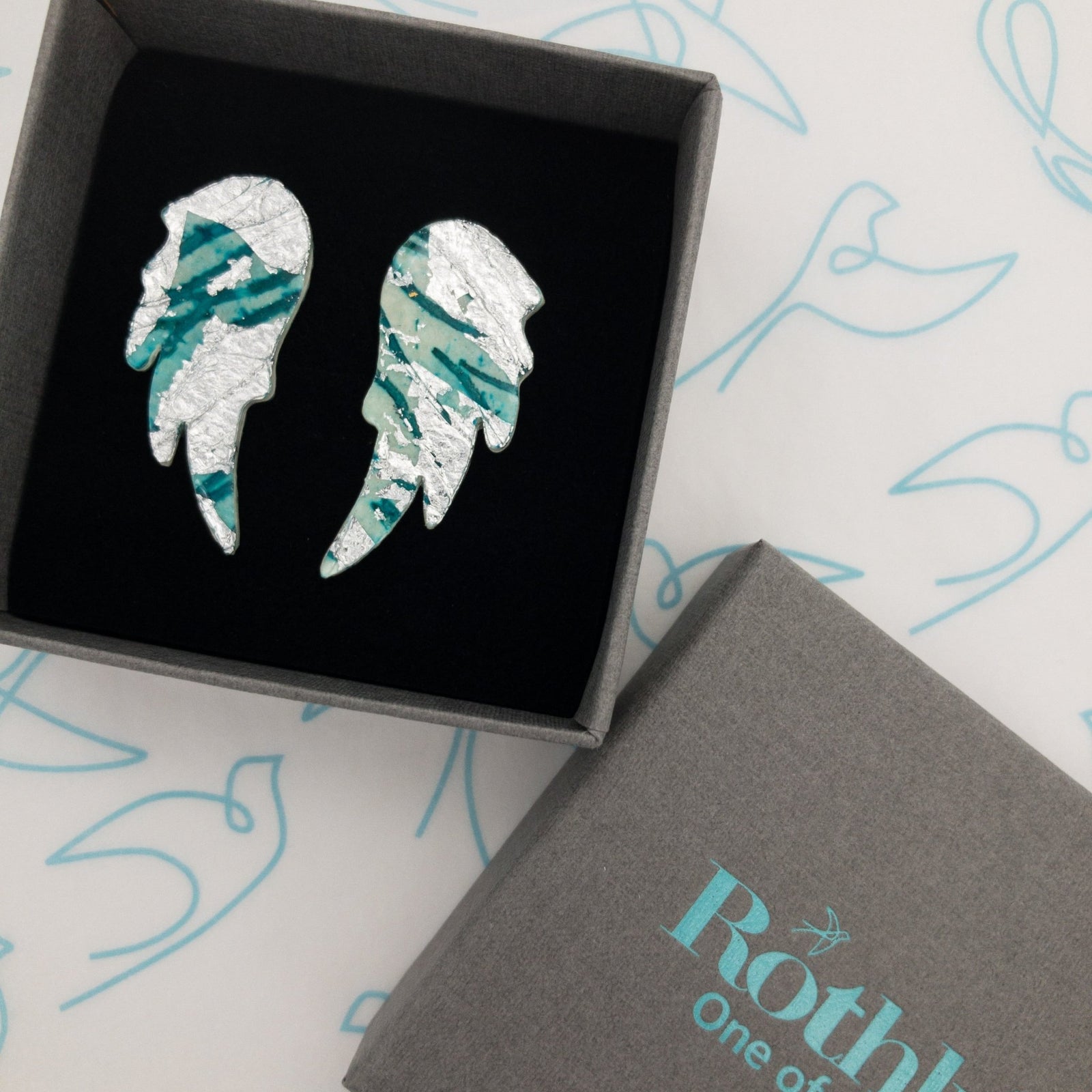 Wings of Desire sgraffito earrings in silver/sea blue - Rothlú